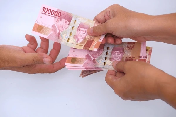 Gambar ilustrasi sesseorang yang sedang berhutang